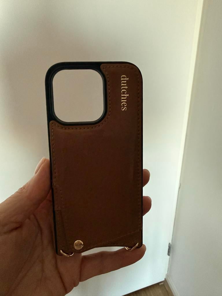Dutchies hoesje met koord voor iPhone 16 Pro, Met koord, Dutchies, Bruin, Hoesje of Tasje