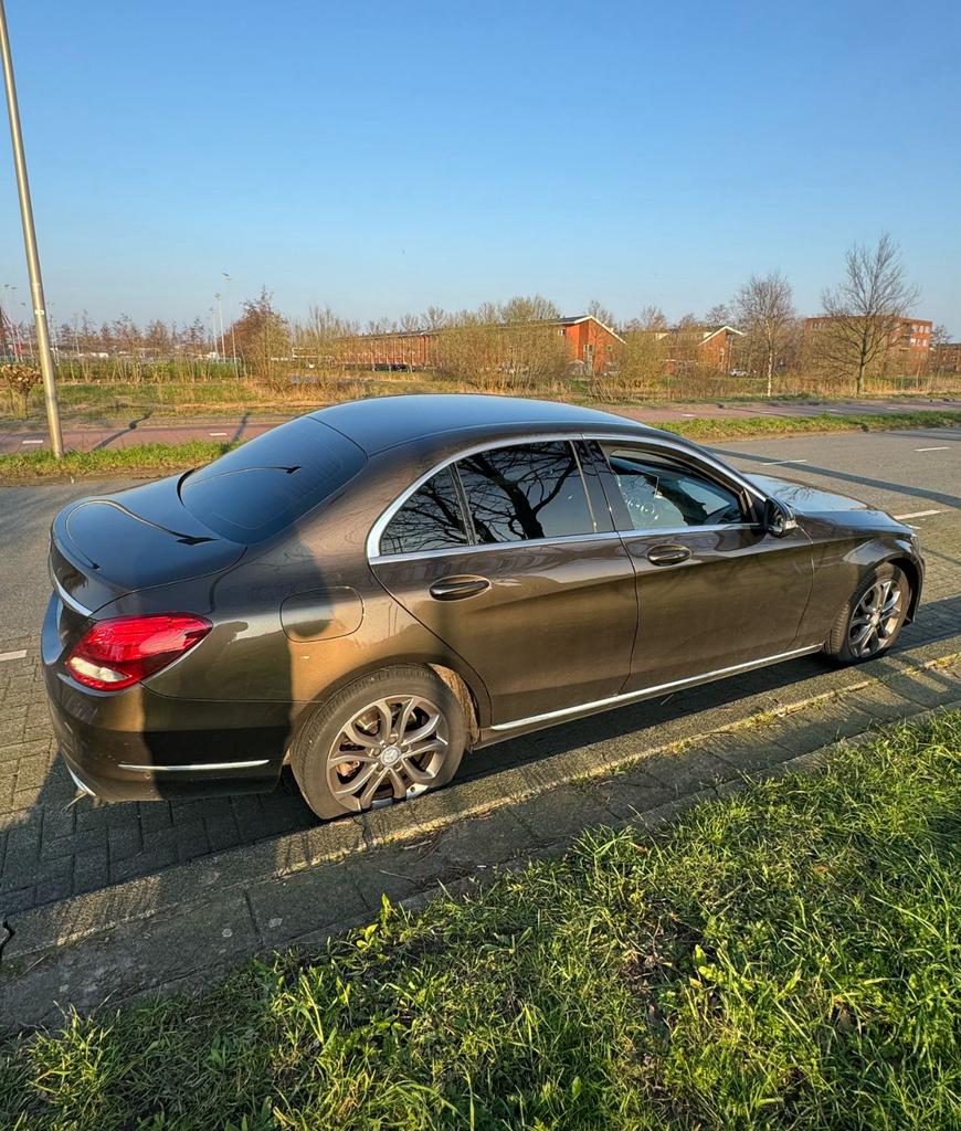Mercedes-Benz C-Klasse C180 1.6 115KW Aut7 2014 Bruin, Auto's, Mercedes-Benz, Automaat, 1800 kg, Bruin, 1595 cc