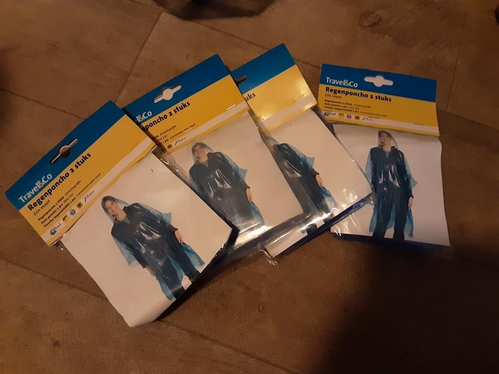 50x2 stuks Travel & Co regenponcho's - Nieuw, Ophalen of Verzenden, Nieuw, Regenpak, Heren