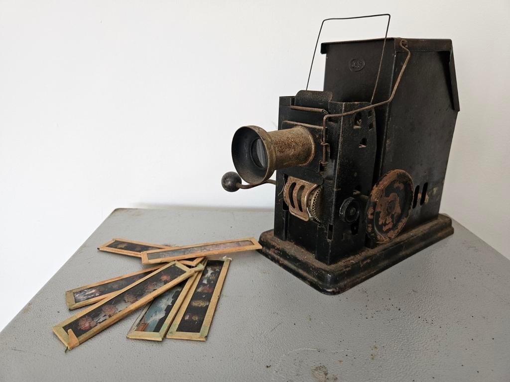 Antieke toverlantaarn met film, Antiek en Kunst, Ophalen of Verzenden