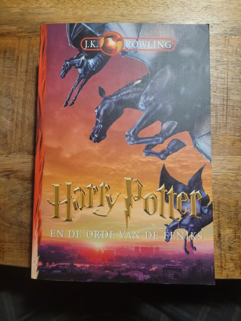 J.K. Rowling - Harry Potter en de orde van de Feniks, Boeken, Kinderboeken | Jeugd | 10 tot 12 jaar, Ophalen of Verzenden, Gelezen