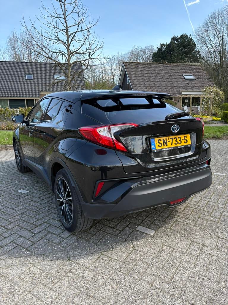 Toyota C-HR 1.8 Hybrid 122pk CVT 2018 Zwart, Auto's, Toyota, 725 kg, Zwart, 4 cilinders, Zwart