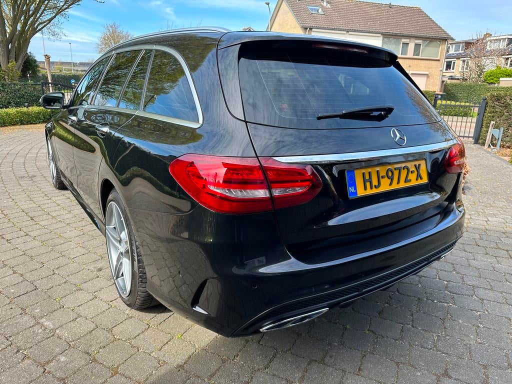 Mercedes-Benz C-klasse Estate 350 e AMG, Luchtvering, Memory, Automaat, Achterwielaandrijving, Gebruikt, Zwart