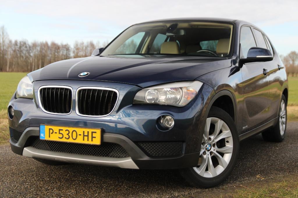 BMW X1 Sdrive 18i,Leder,Navi,Camera,Clima,Cruise,Trekhaak, 136 pk, 1995 cc, 4 cilinders, Blauw