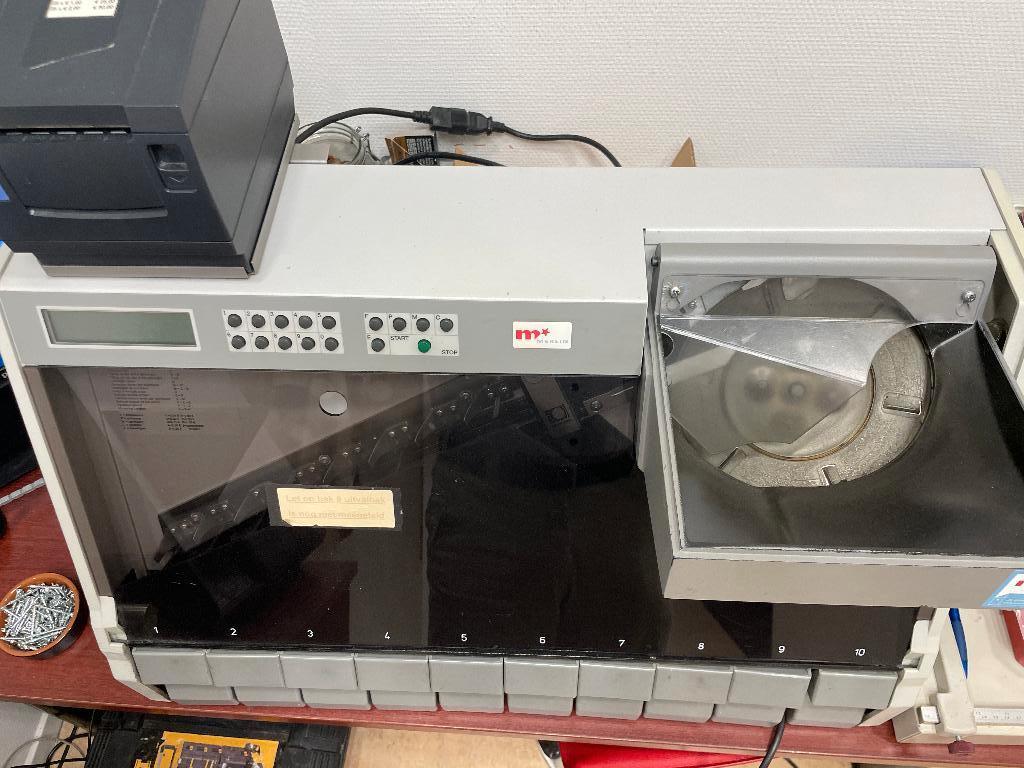 geldtel machine met printer, Ophalen