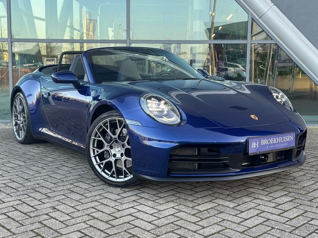 Porsche 911 Cabrio 3.0 Cabrio Carrera 395pk Stoelventilatie, Auto's, Automaat, Achterwielaandrijving, Gebruikt, Zwart