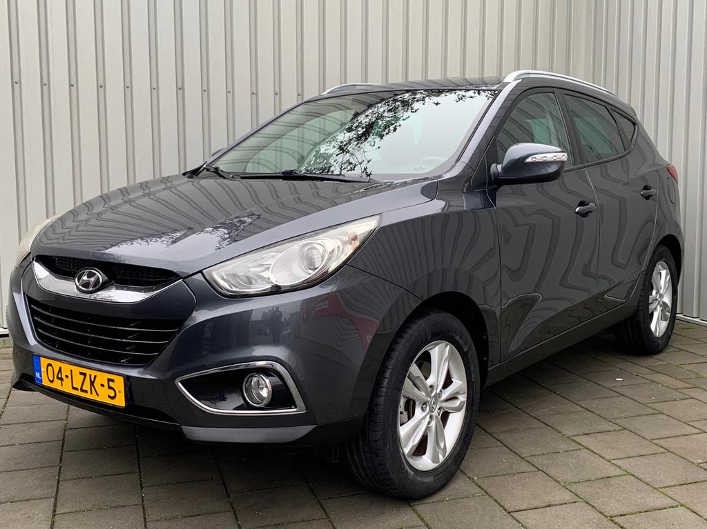 Hyundai Ix35 2.0i Business Edition|Navigatie|149000KM|Climat, Gebruikt, Zwart, 4 cilinders, Leder en Stof