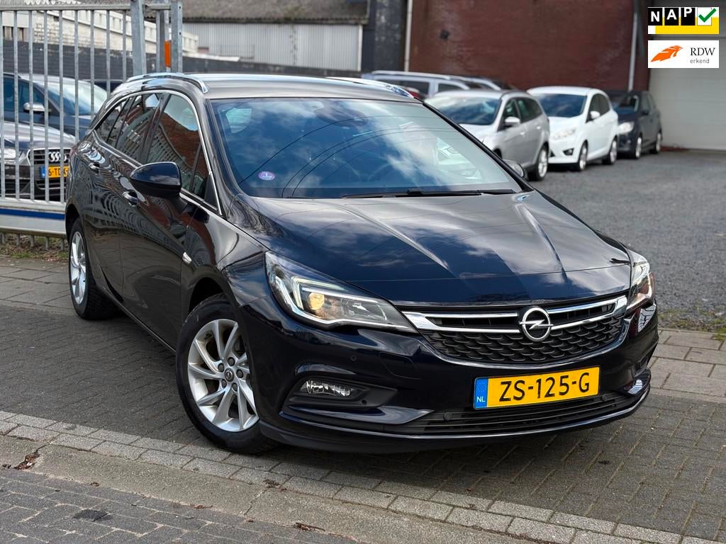 Opel Astra Sports Tourer 1.0 Turbo Business Executive | Trek, Gebruikt, 1178 kg, Blauw, Origineel Nederlands