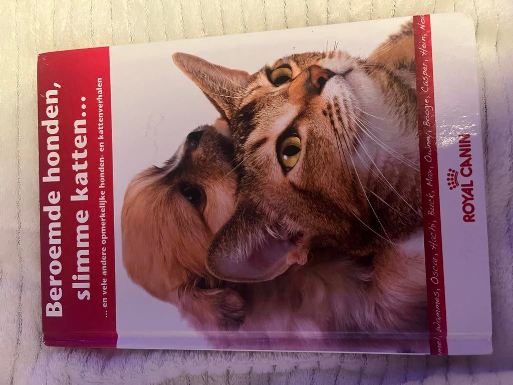 Beroemde honden, slimme katten - Royal Canin boek, Ophalen of Verzenden, Gelezen, Honden