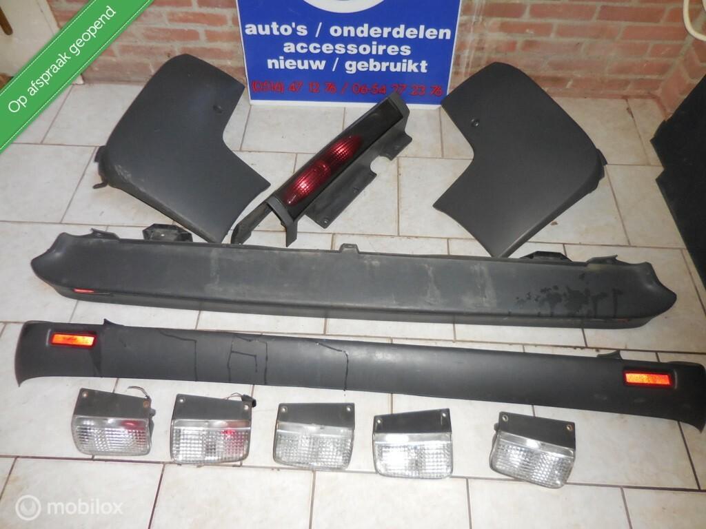 Achterbumper bumperhoek en achterlicht Opel Vivaro '01 - '14, Gebruikt, Opel, Ophalen of Verzenden, Opel