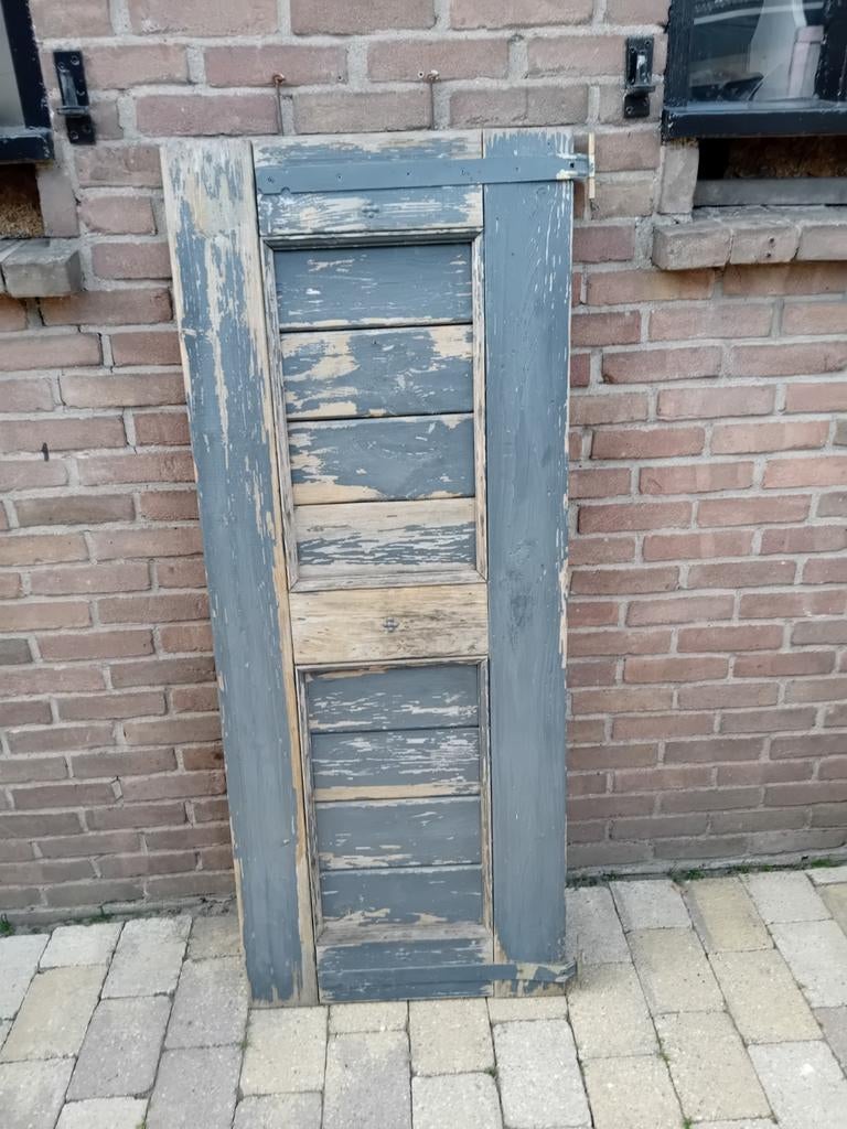 Prachtige oude luik, Ophalen