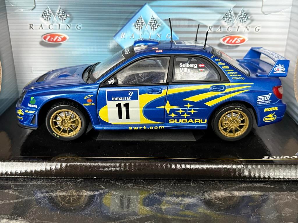 Solido 1/18 Subaru Impreza WRC 2002 - Solberg, Hobby en Vrije tijd, Modelauto's | 1:18, Ophalen of Verzenden, Zo goed als nieuw