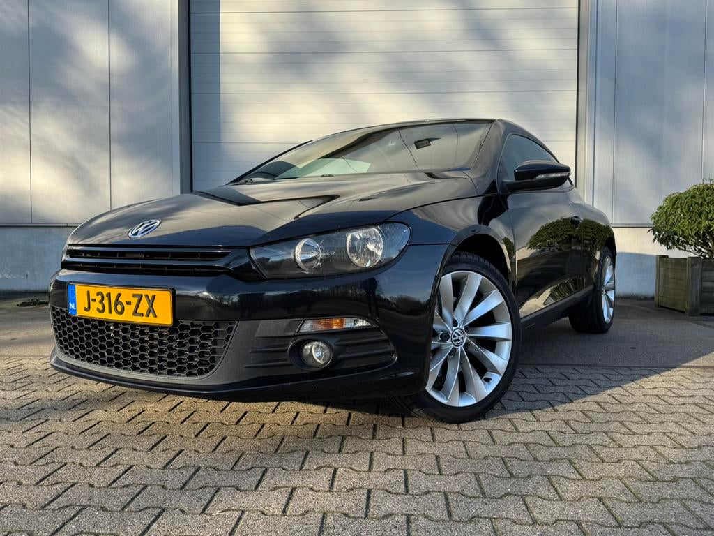 Volkswagen Scirocco 1.4 TSI 118KW DSG 2010 Zwart, Auto's, Volkswagen, Euro 5, Stof, Zwart, 4 cilinders