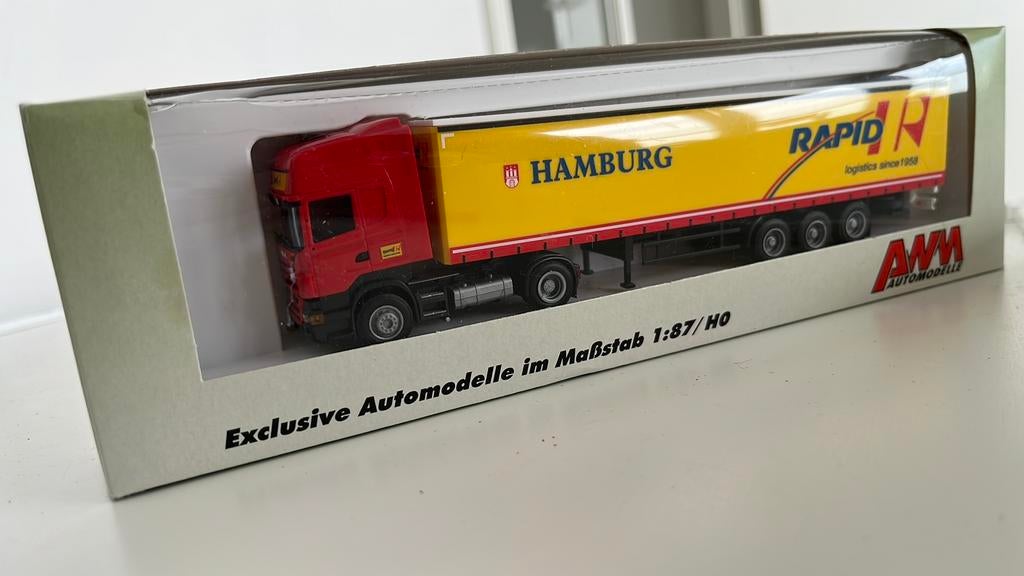AWM Automodel Vrachtwagen Hamburg Rapid Logistics, Hobby en Vrije tijd, Modelauto's | 1:87, Ophalen of Verzenden, Nieuw, Bus of Vrachtwagen