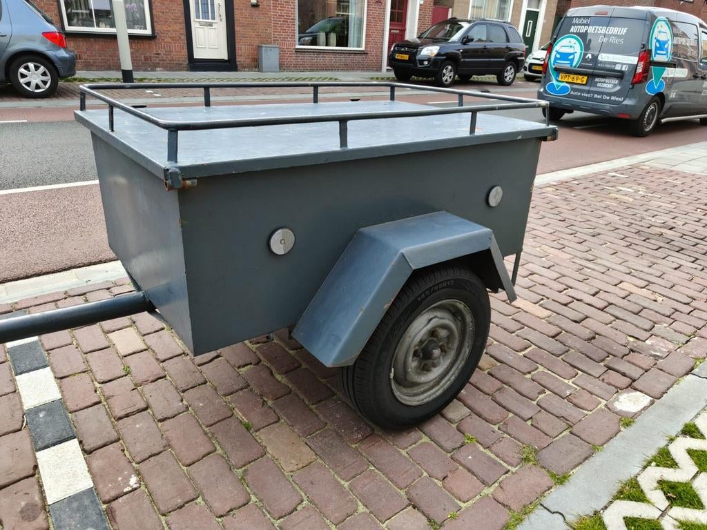 Aanhangwagen met deksel, Ophalen, Gebruikt