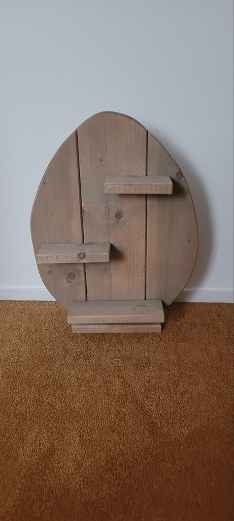 Houten Paasei., Ophalen