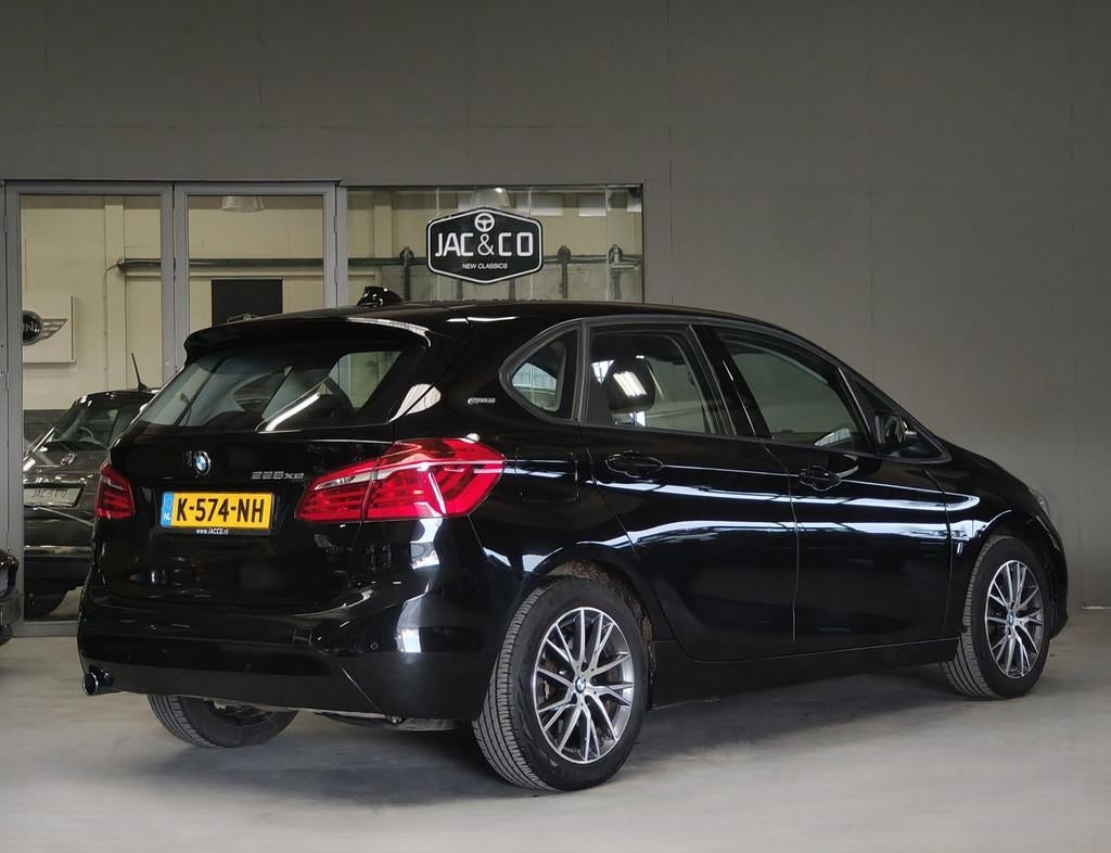 BMW 2-serie Active Tourer 225xe Executive Plug-in hybrid, Auto's, Automaat, Stof, Gebruikt, Zwart