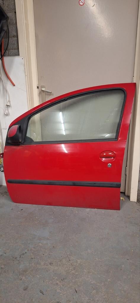 Peugeot 107 linker voorportier met centrale vergrendeling, Ophalen of Verzenden