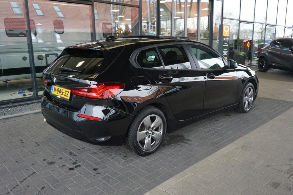 BMW 1-serie 116i Business Edition | Schuif-/kanteldak | Navi, 1-Serie, 12 maanden, Gebruikt, Zwart