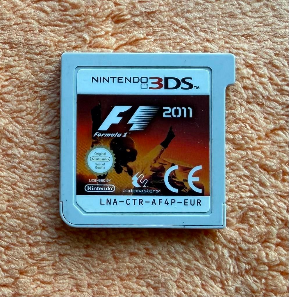 F1 2011 Nintendo 3DS game cartridge, Spelcomputers en Games, Games | Nintendo 2DS en 3DS, Ophalen of Verzenden, Gebruikt, Racen en Vliegen