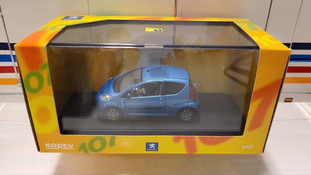 Norev Peugeot 107 3-deurs Blue Metallic, Hobby en Vrije tijd, Modelauto's | 1:43, Auto, Norev, Ophalen of Verzenden, Zo goed als nieuw