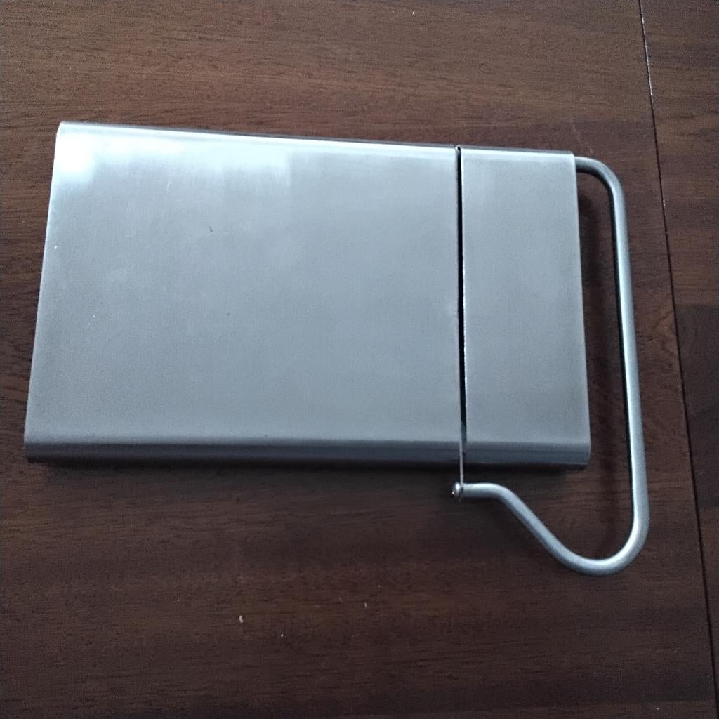 Rvs kaassnijder voor zachtere kaas plus reserve mesje, Ophalen of Verzenden, Zo goed als nieuw