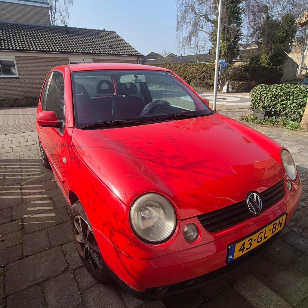 Volkswagen Lupo 1.4 55KW 2001 Rood, 74 pk, 4 cilinders, 4 stoelen, Leder en Stof