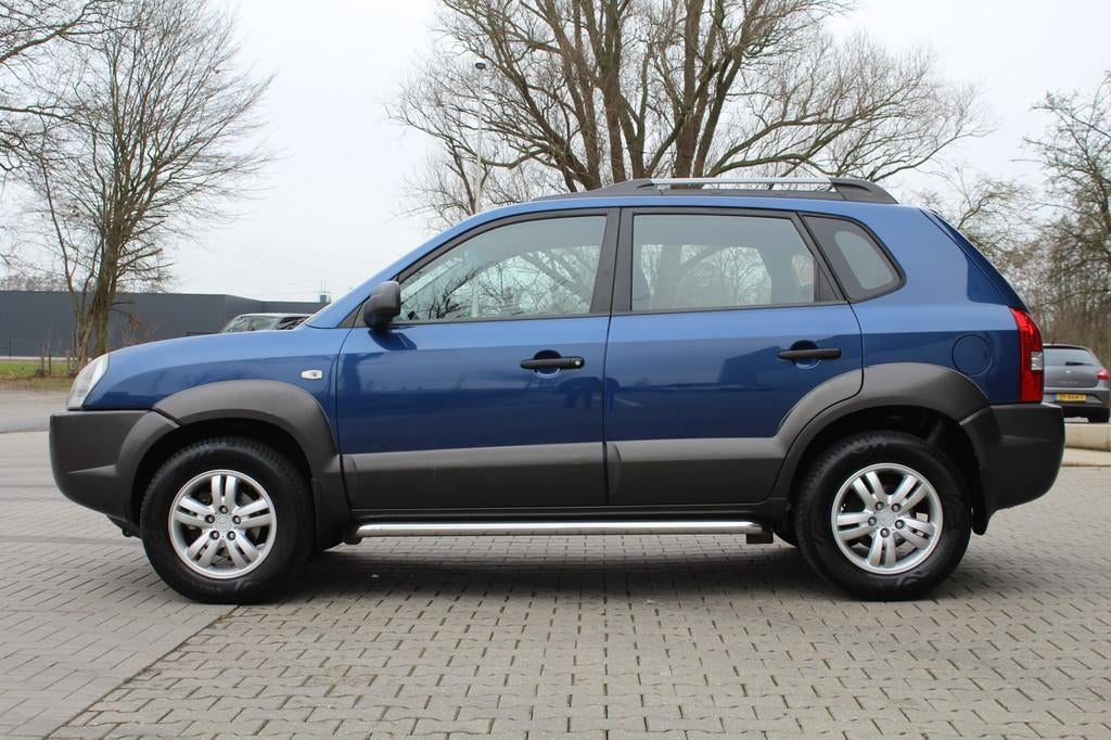 Hyundai Tucson 2.0i Active | Trekhaak | DAB+ | Airco | PDC |, Stof, Gebruikt, 4 cilinders, Blauw