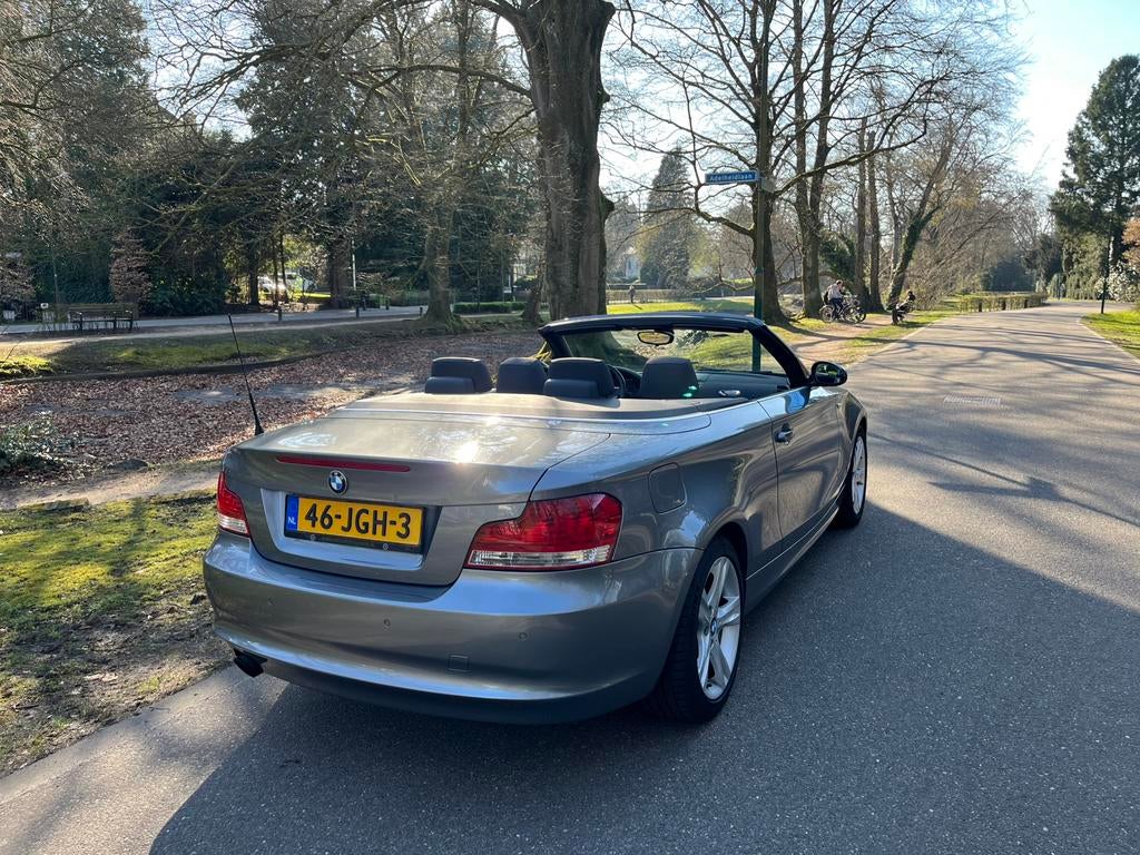 BMW 1-Serie 2.0 118I Cabrio 2009 Grijs, Auto's, BMW, 1-Serie, Achterwielaandrijving, 1995 cc, Zwart