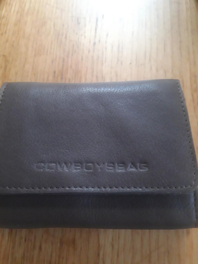 Cowboysbag portemonnee, Ophalen