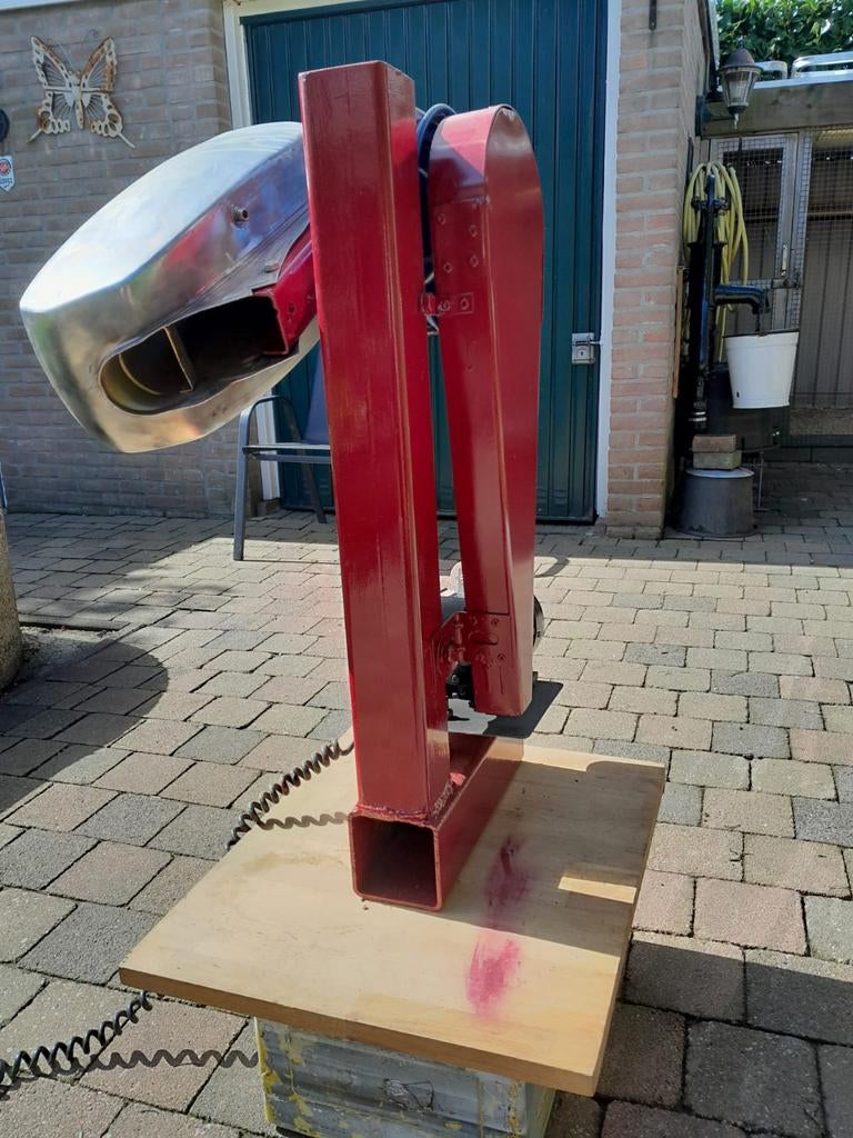 Benzine tank reiniger, Ophalen