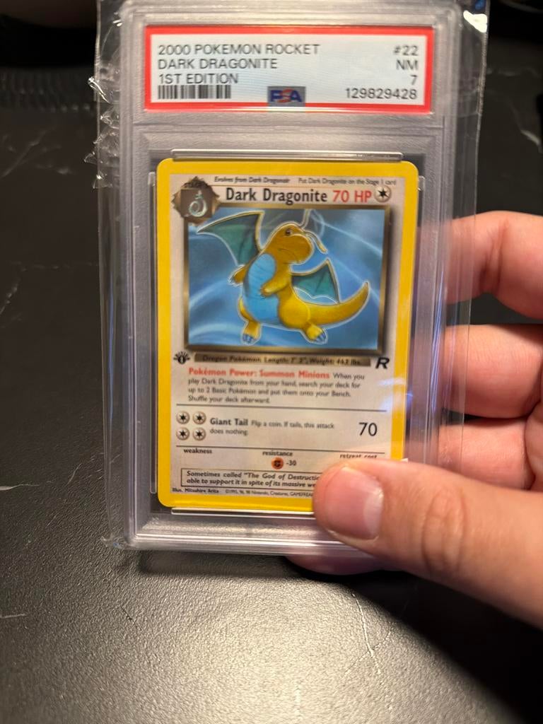 Pokémon Rocket Dark Dragonite 1st Edition PSA 7, Ophalen of Verzenden, Gebruikt, Losse kaart