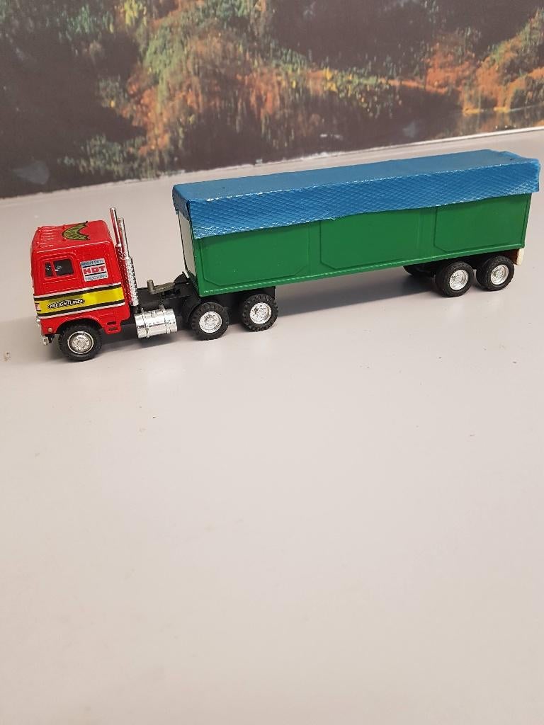 Te koop Freightliner 6x4 met oplegger 1/50, Ophalen of Verzenden, Zo goed als nieuw, Bus of Vrachtwagen, Lion Toys