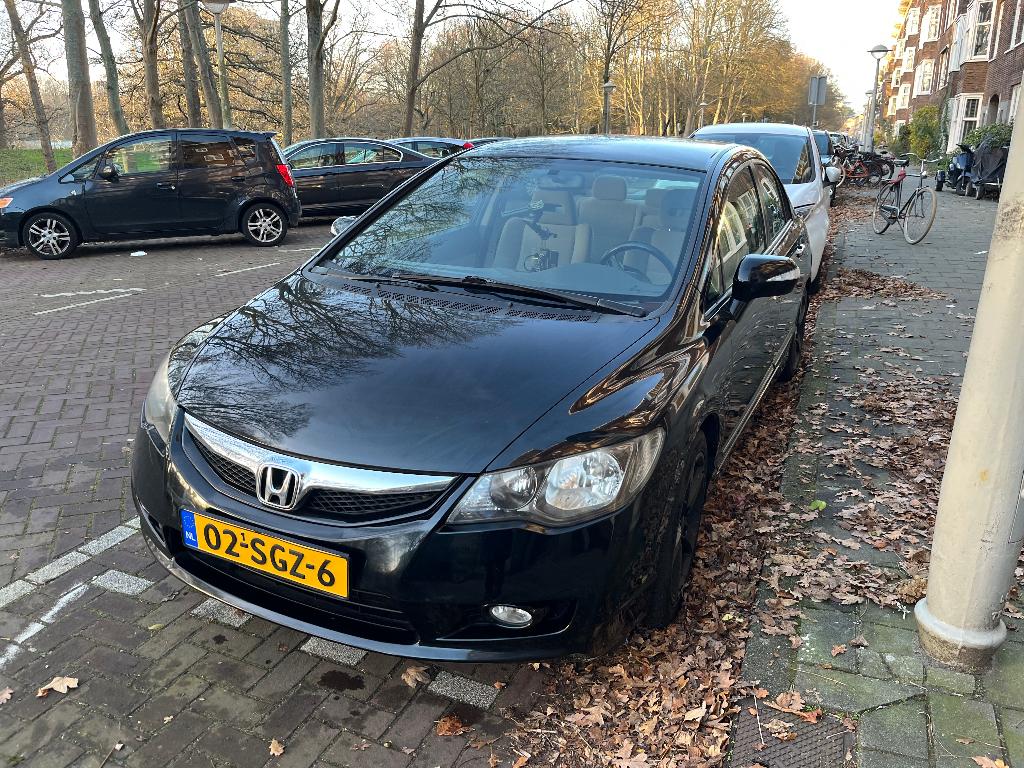 Honda Civic 1.3 Vtec Hybrid 4DR C-tr. 2011 Zwart, Auto's, Beige, Airbags, Zwart, Origineel Nederlands