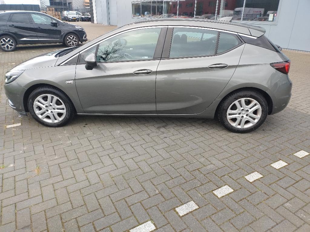 Opel Astra 1.0 Turbo 77KW 5D 2017 Grijs, Stof, 610 kg, 23 km/l, Origineel Nederlands