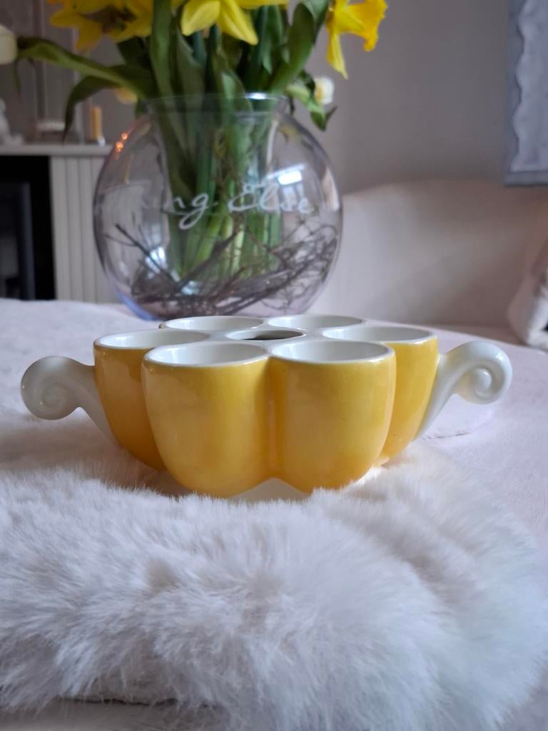 Eier standaard, Ophalen