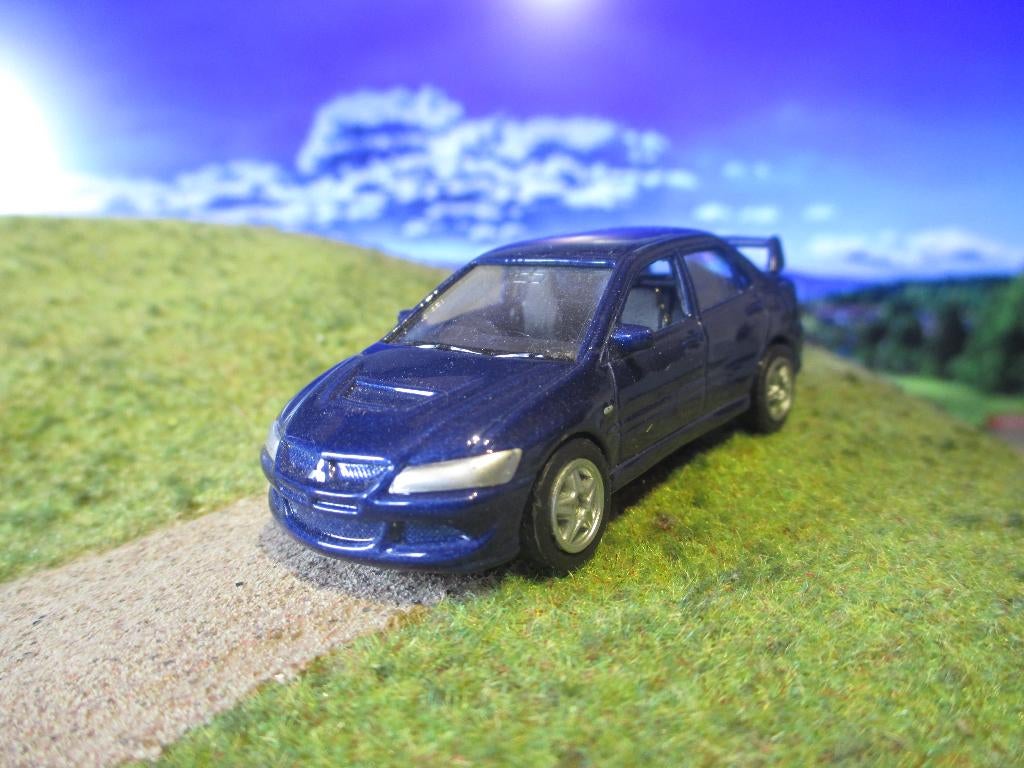 1:64 Mitsubishi Lancer Evo VIII - Welly, Ophalen of Verzenden, Gebruikt, Auto