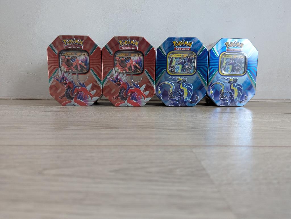 Pokémon Paldea Legends Tin (Koraidon/Miraidon), Ophalen of Verzenden, Nieuw, Overige typen, Foil