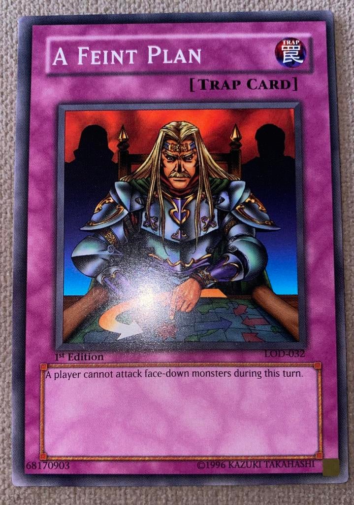 Yu-Gi-Oh! Misprint A Feint Plan LOD in 1st Edition M/NM !, Ophalen of Verzenden, Zo goed als nieuw, Losse kaart
