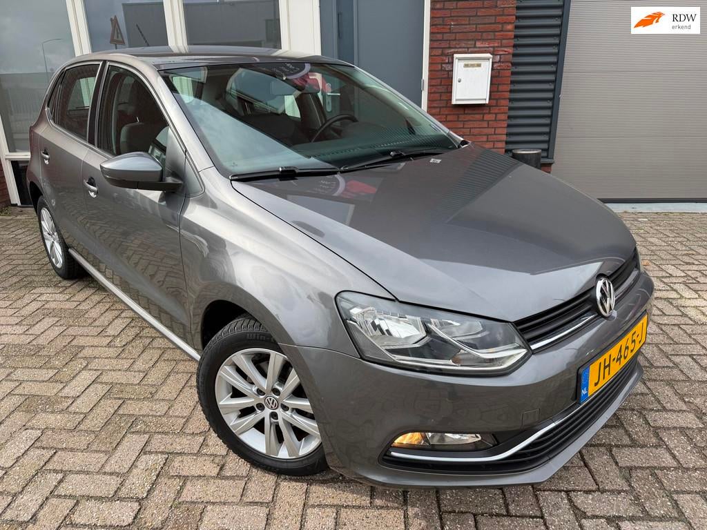 Volkswagen Polo 1.2 TSI Comfortline / Airco / Cruise / LM /, Auto's, Stof, 4 cilinders, Met garantie (alle), Handgeschakeld