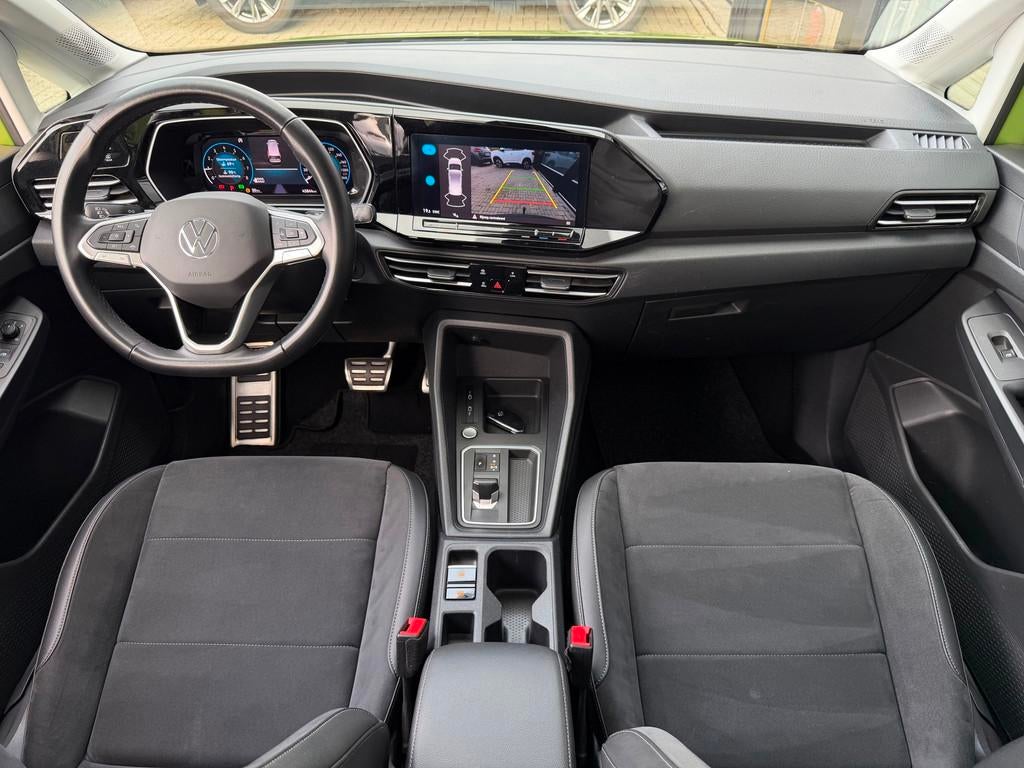 Volkswagen Caddy Maxi 1.5 TSI 7p DSG Full Option Panoramadak, Auto's, 1556 kg, Zwart, 4 cilinders, 7 stoelen