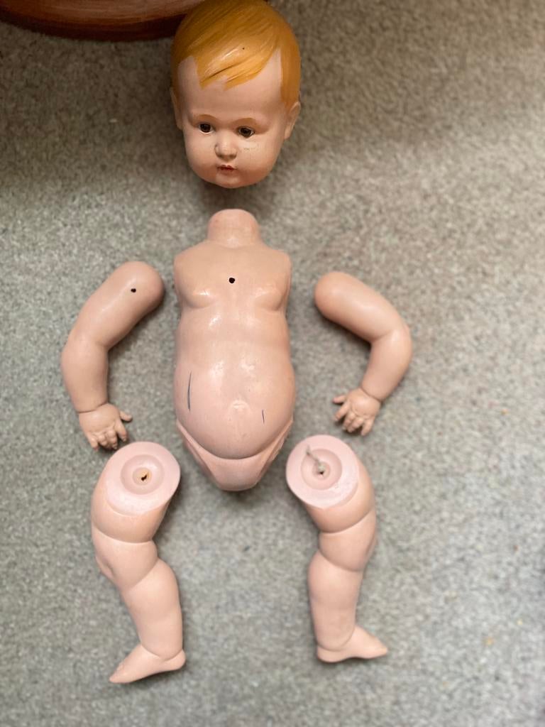 Antieke vooroorlogse kinderspeelgoed pop, Ophalen