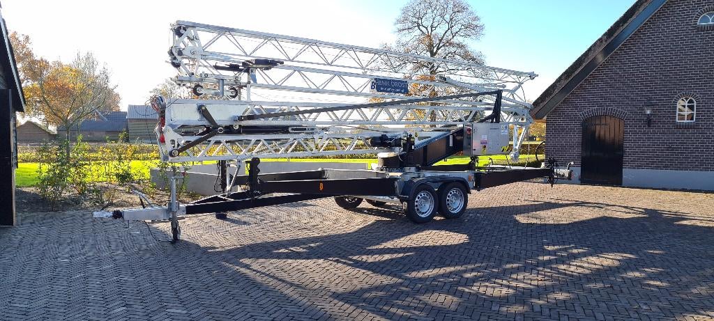 Electrische aanhanger bouwkraan te koop / huur, Ophalen, Hijswerktuig
