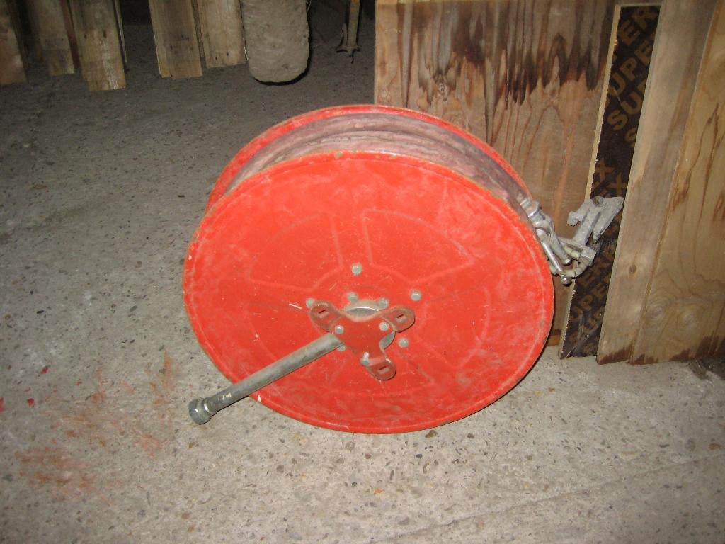 brandslang haspel, Ophalen, Gebruikt, Brandblusser