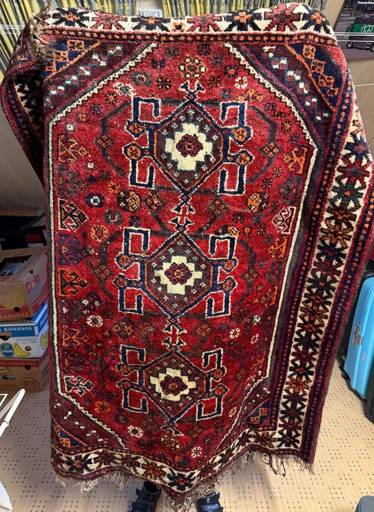 Perzisch tafelkleed, Ophalen