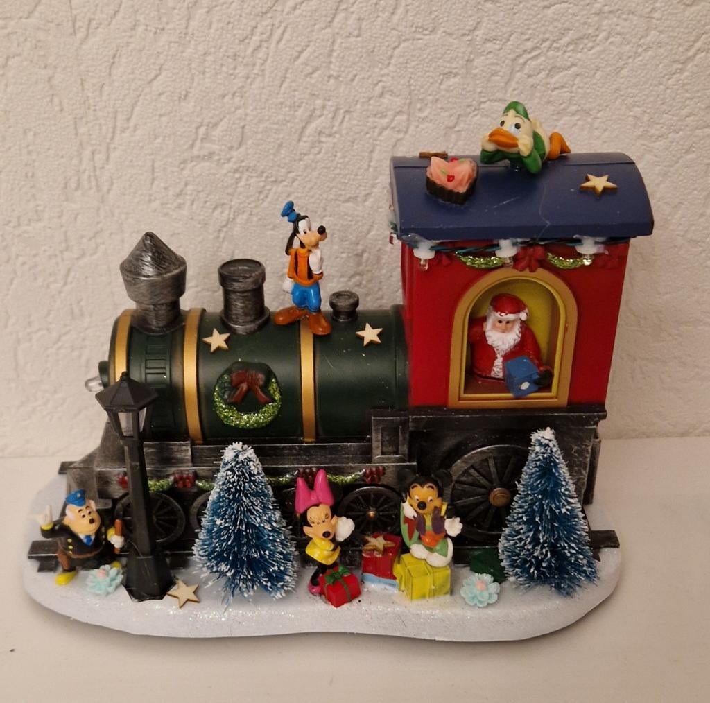 Kerst treintje met Disney 2

Met o.a
Minnie.micky.goofy., Diversen, Kerst, Nieuw, Ophalen of Verzenden