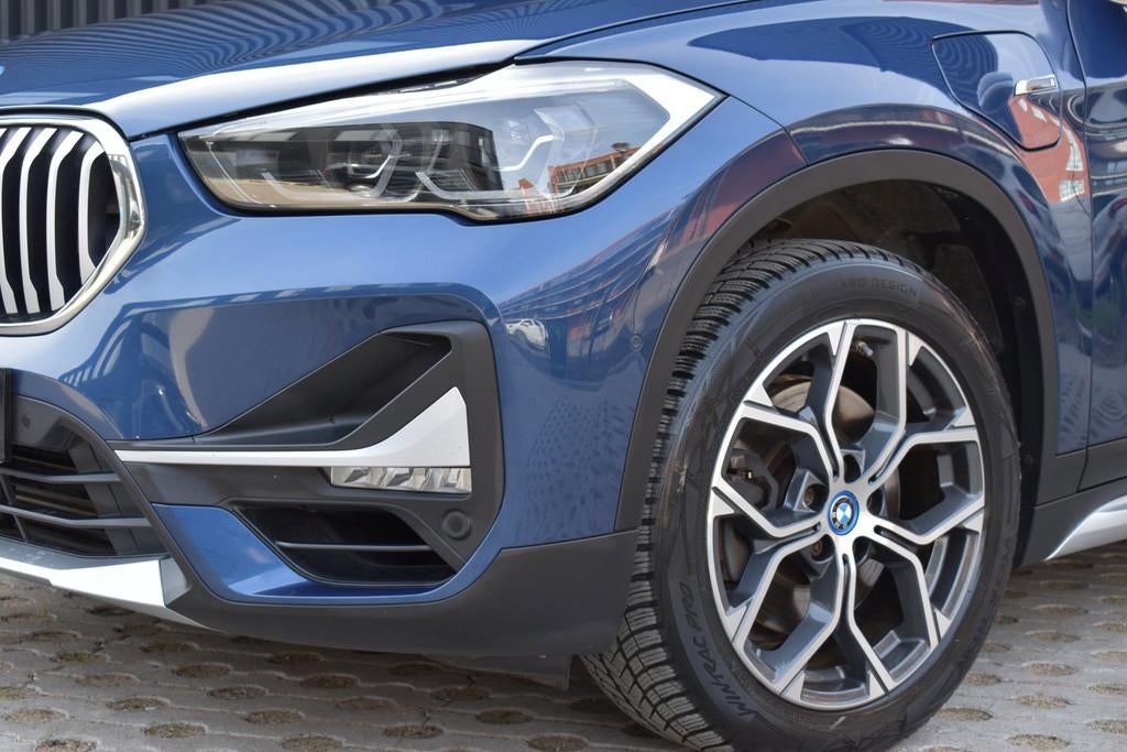BMW X1 XDrive25e High Executive xLine | PANO | TREKHAAK | LE, 8 kWh, Gebruikt, Blauw, Vierwielaandrijving