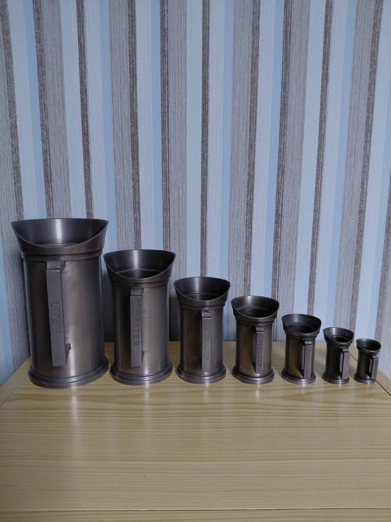 Tinnen maatbekerset 7 delig 94% tin, Ophalen