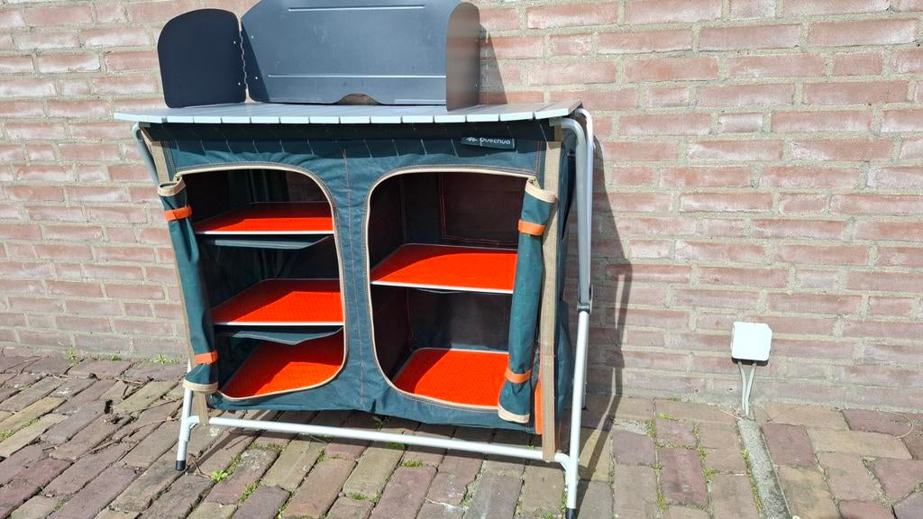 Quechua buitenkeuken, Ophalen