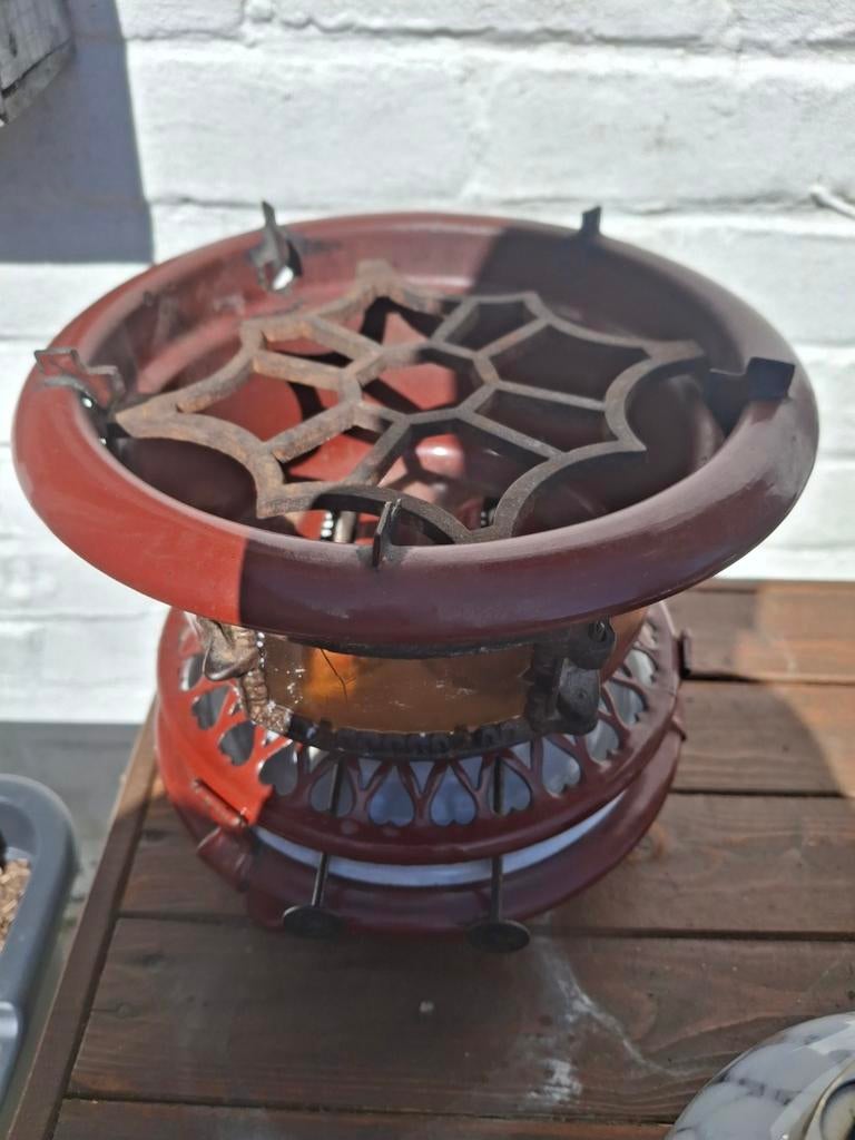 Oliestel met twee nieuwe lonten, Ophalen